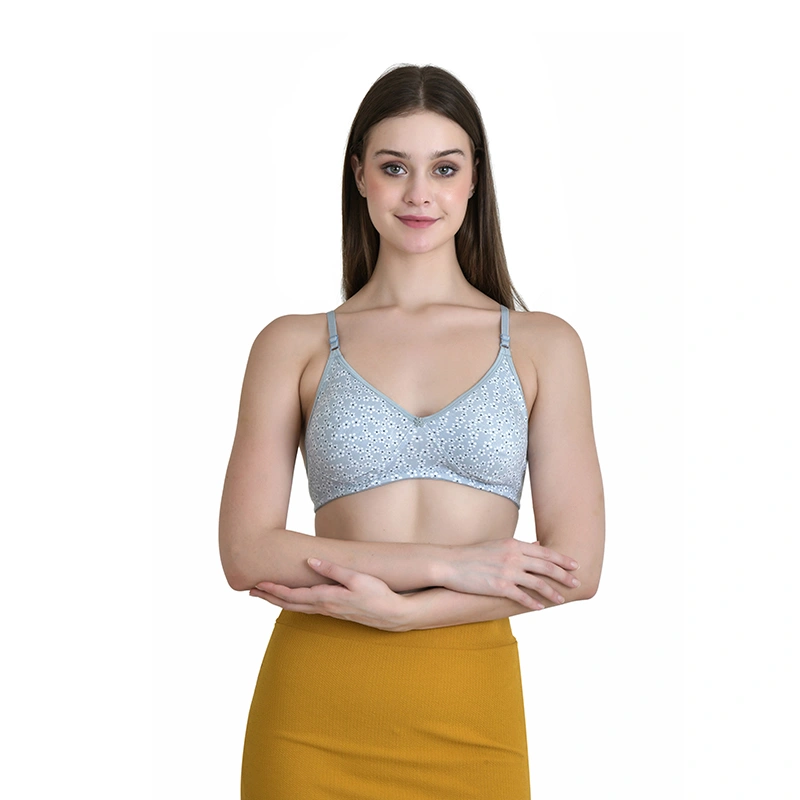 Light grey floral print bra with thin straps and mustard yellow skirt - lingerie ecommerce photography by Lohar Studio Delhi